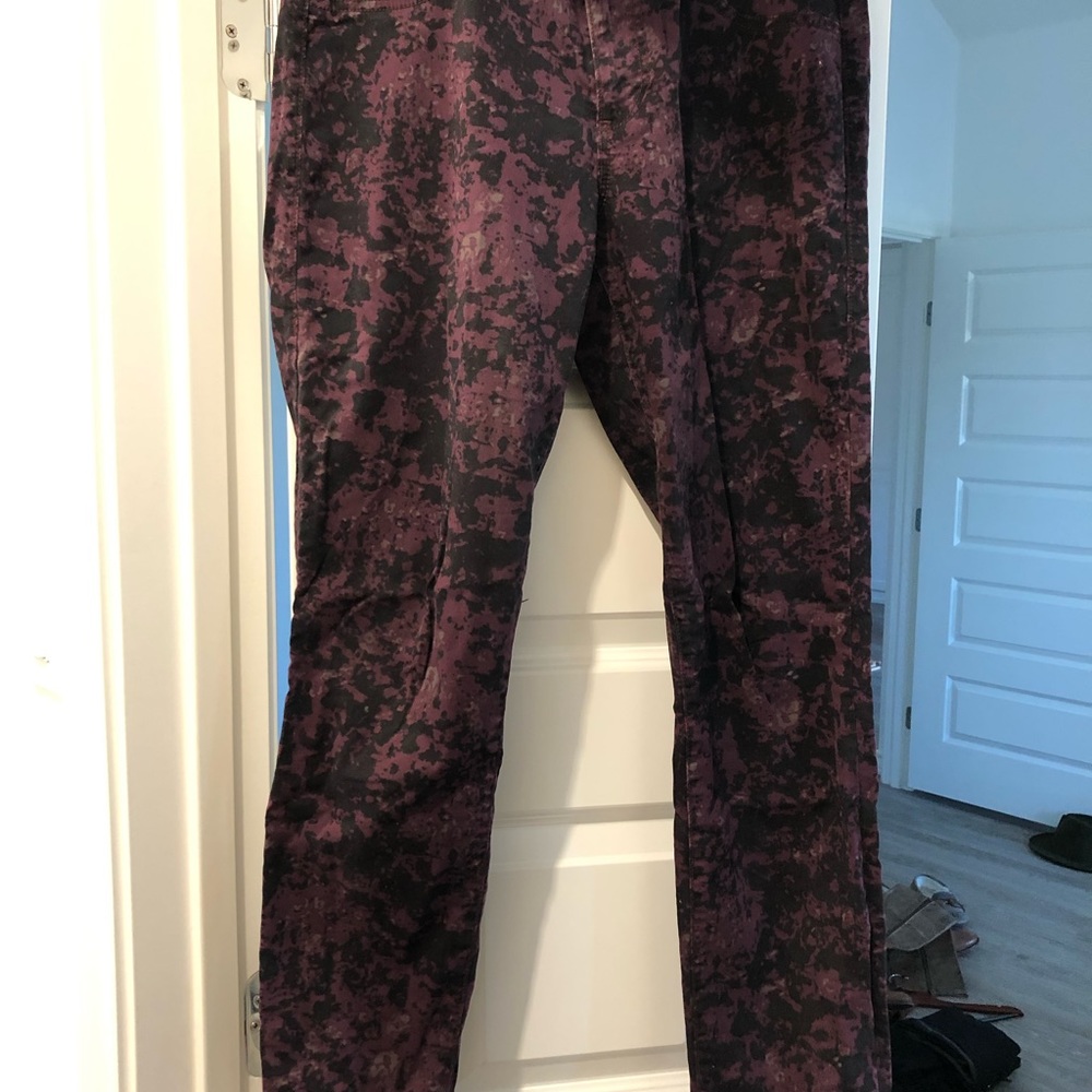 Cabi jeans. Purple/black camo jeans with zipper front.